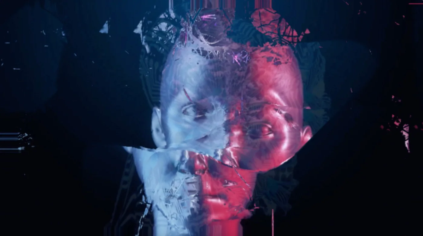 Still from Cyber Maze: a human head split into blue and red halves, breaking into shards against a dark background
