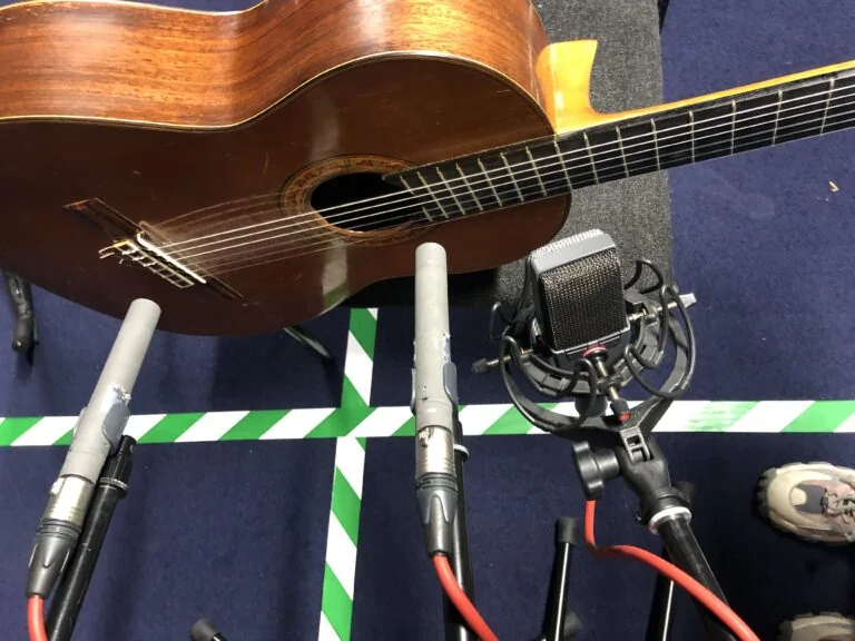 Acoustic guitar recorded with a pair of small-diaphragm condenser microphones and a large-diaphragm microphone